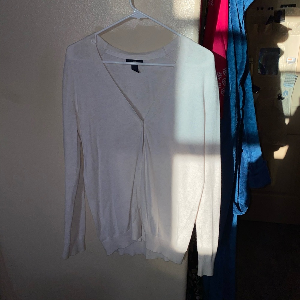 cream colored cardigan